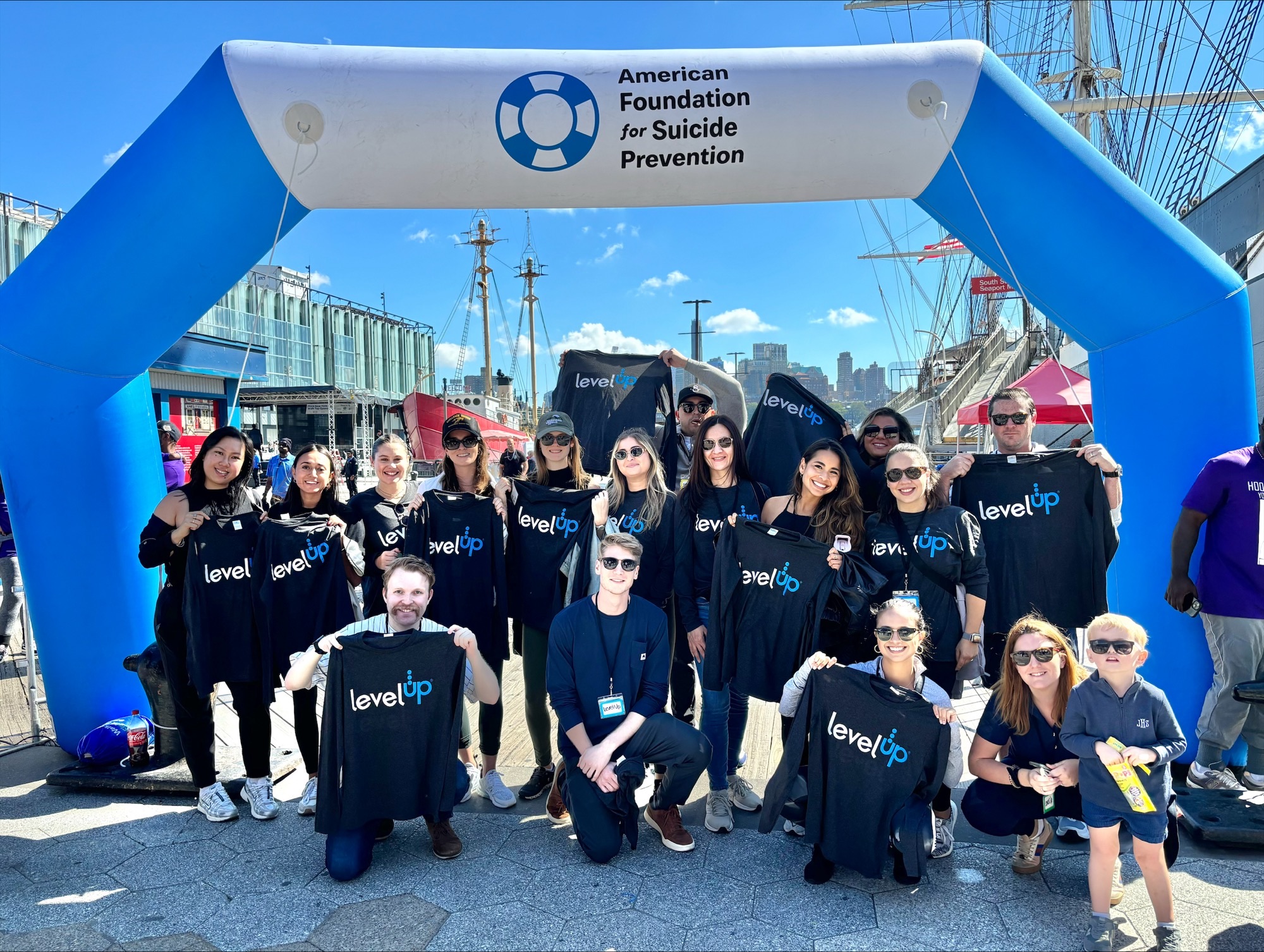 LevelUP Corporate Citizenship group photo at a non-profit event