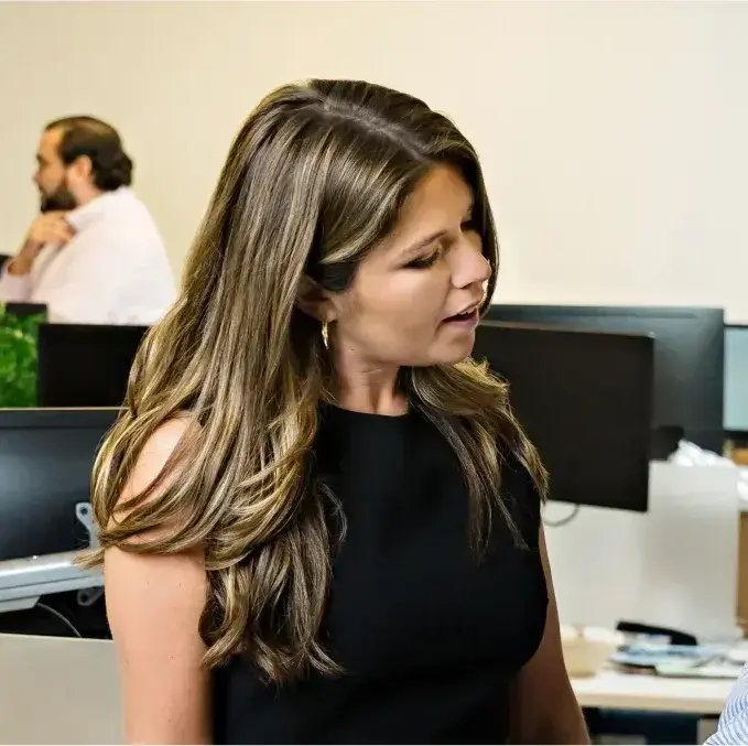 a businesswoman chatting to her Colleague