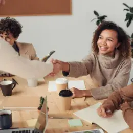 Smiling female recruiter at a table
